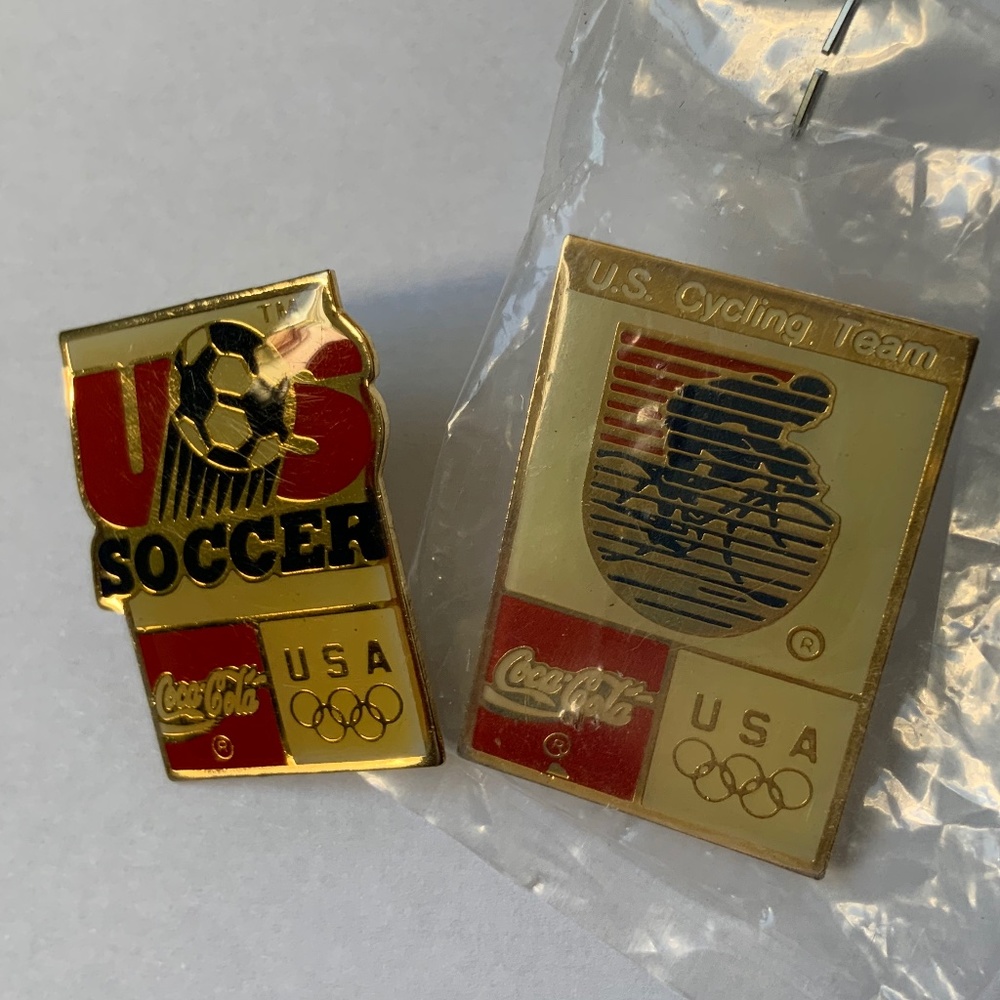 Set of 2 Vintage US Olympic Collector pins; Soccer & Cycling, Coca-Cola
